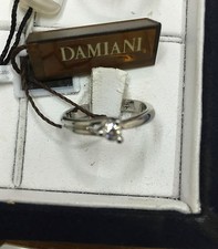 Anello Solitario Damiani tris
